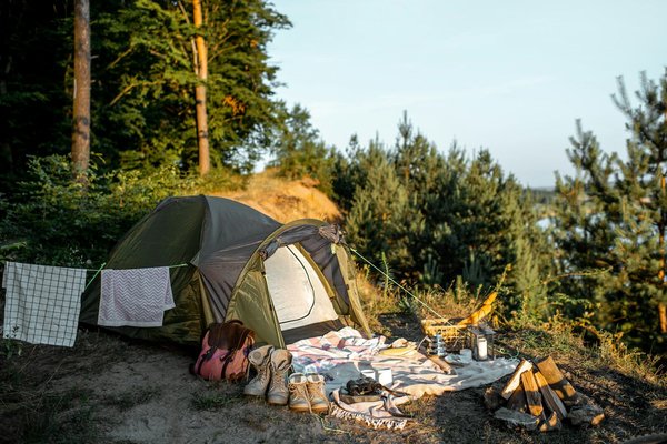 How to plan a camping trip that includes visits to UK coastal areas?